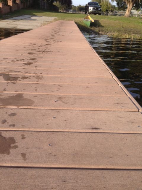 photo of Florida lake dock with footprints