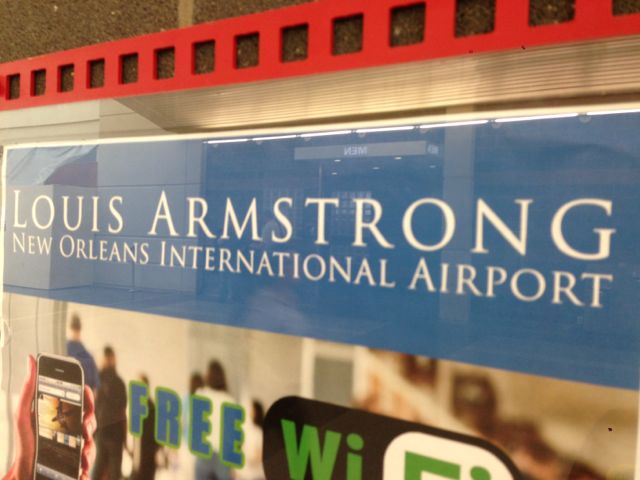 Louis Armstrong New Orleans International airport sign
