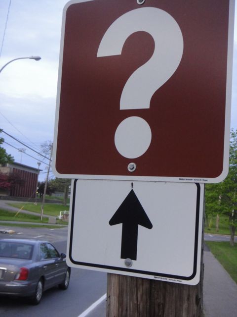 highway information sign, a giant question mark