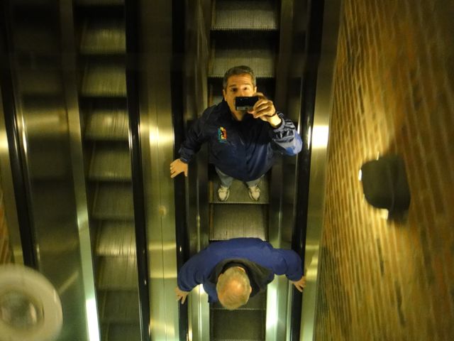 Two colleagues on a Nova Scotia escalator
