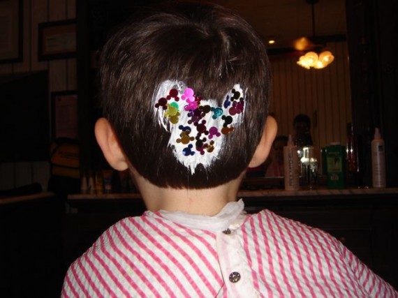 Mickey Mouse design on toddler's hair from Disney haircut on Main Street USA