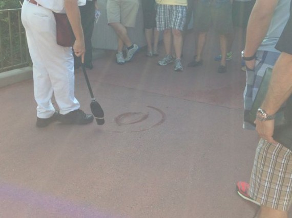 Disney Janitor painting a water Mickey Mouse