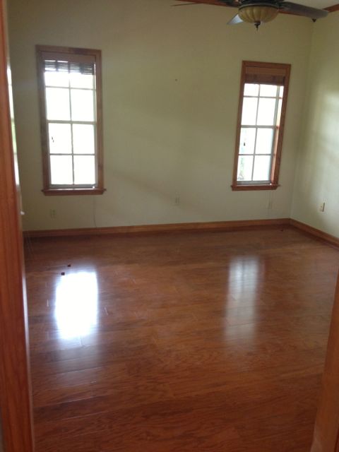 empty room with wooden floors
