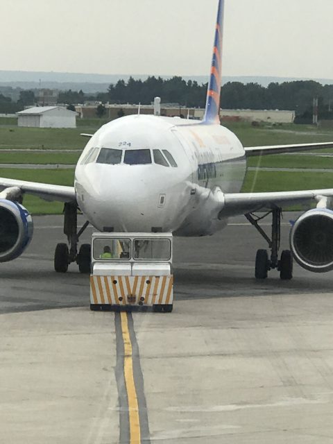 Airline jet being pushed