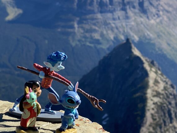 disney toy figurines in the mountains