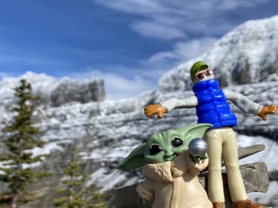 Disney plastic toys in mountain setting