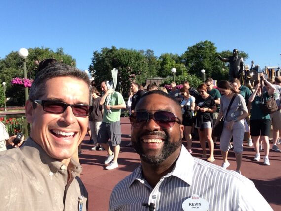 Two smiling Disney institute cast members