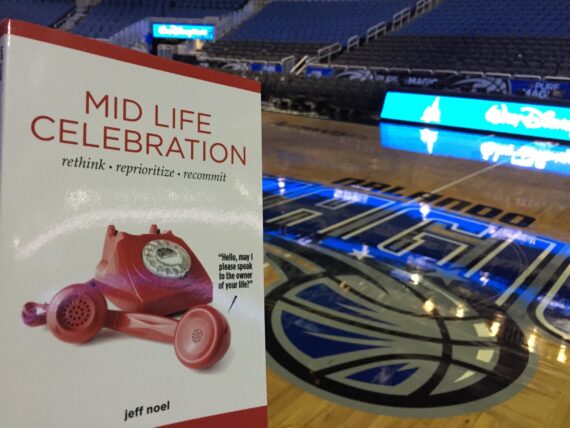 The book Mid Life Celebration Centercourt at the Orlando Magic arena