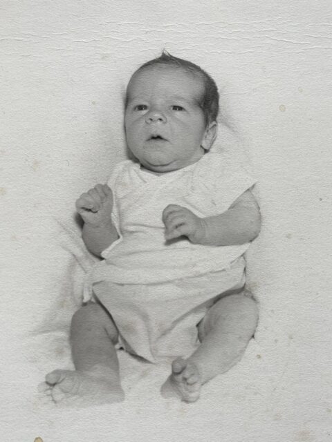 baby in old fashioned diapers from 1950's