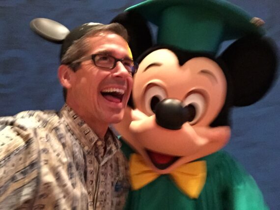 Disney Institute Keynote Speaker Jeff Noel and Mickey Mouse closeup