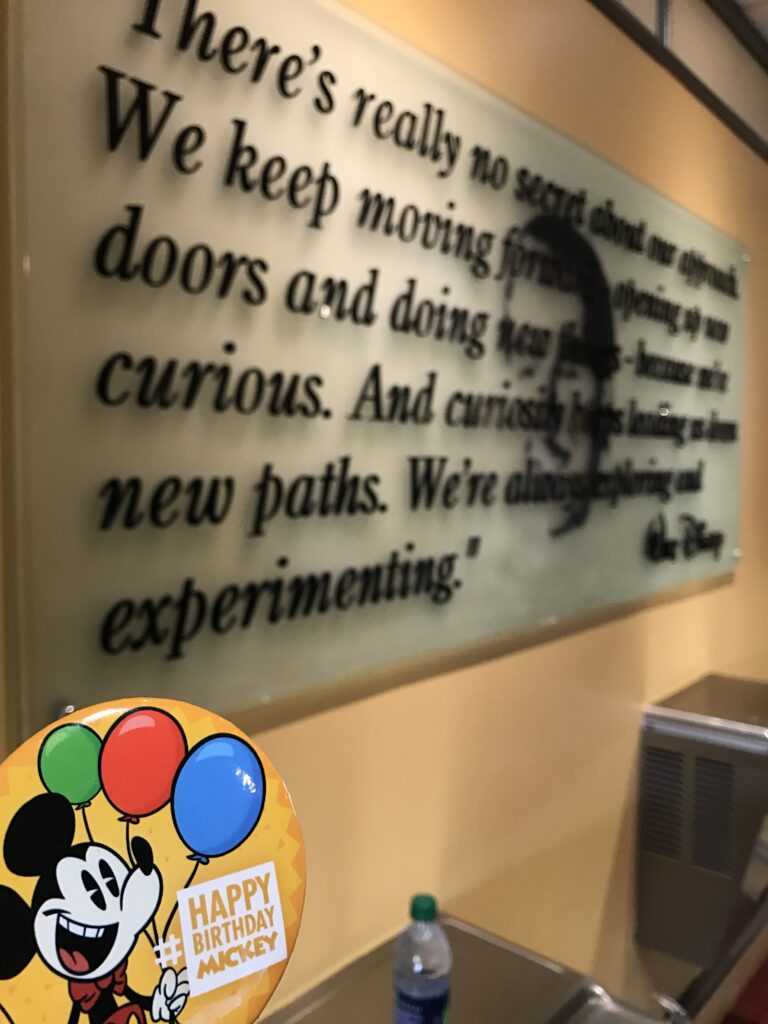 Walt Disney quote framed on a wall