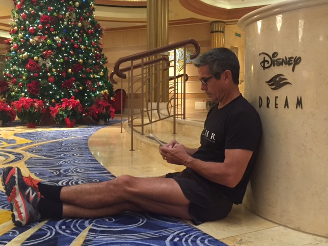 Disney brand loyalty author Jeff Noel writing on iPhone