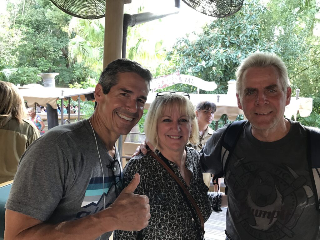 three adults at Disney's Jungle Cruise Attraction