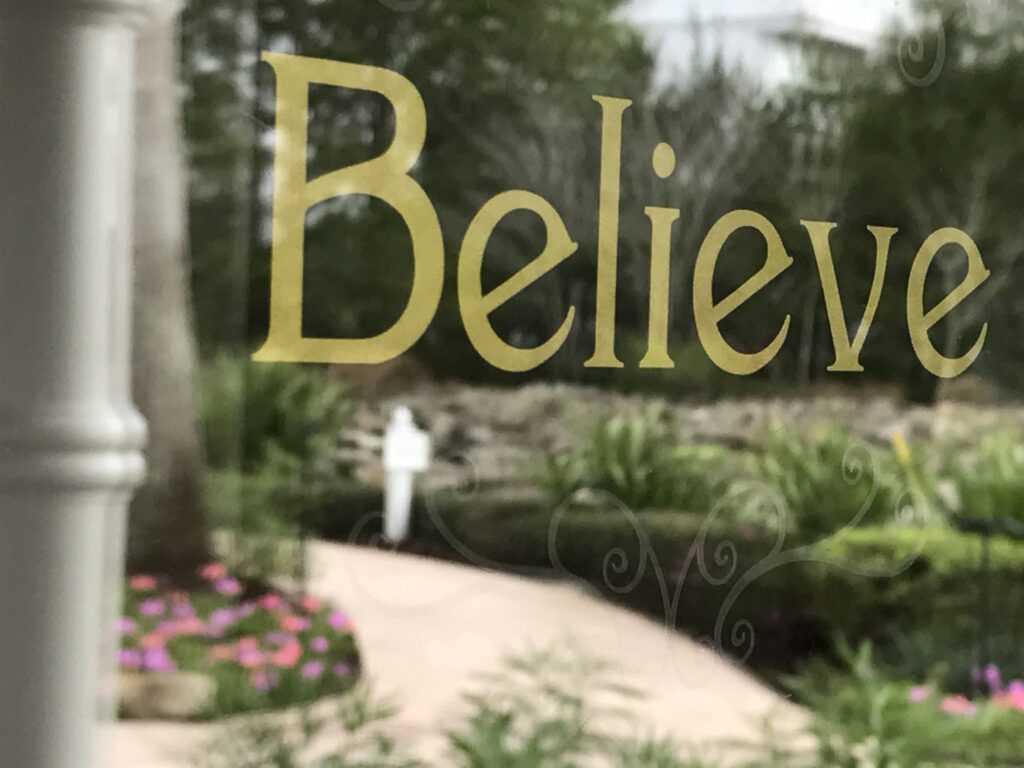 Disney's Wedding Pavilion sign saying Believe