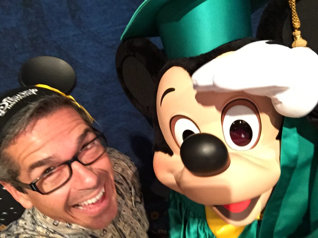 Disney Keynote speaker Jeff Noel with Mickey Mouse