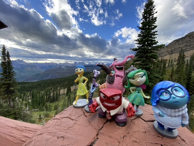 Disney characters in the mountains
