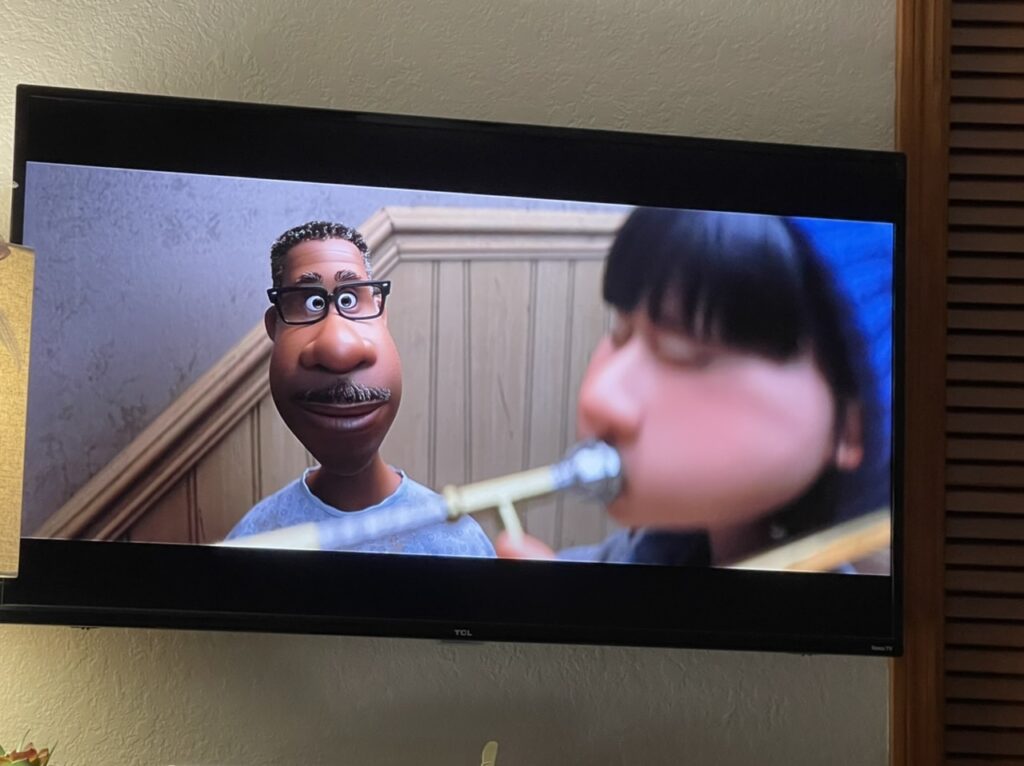 Photo of TV showing a scene from Disney Pixar song
