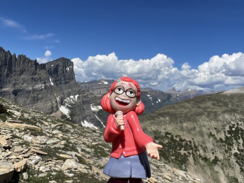 Disney figurine in the mountains