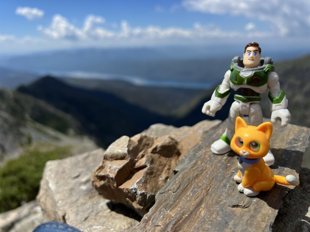 Disney figurines in the mountains