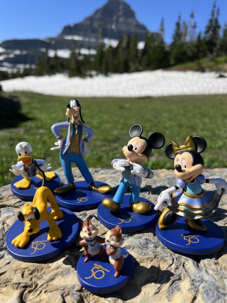 Disney character toys in the mountains