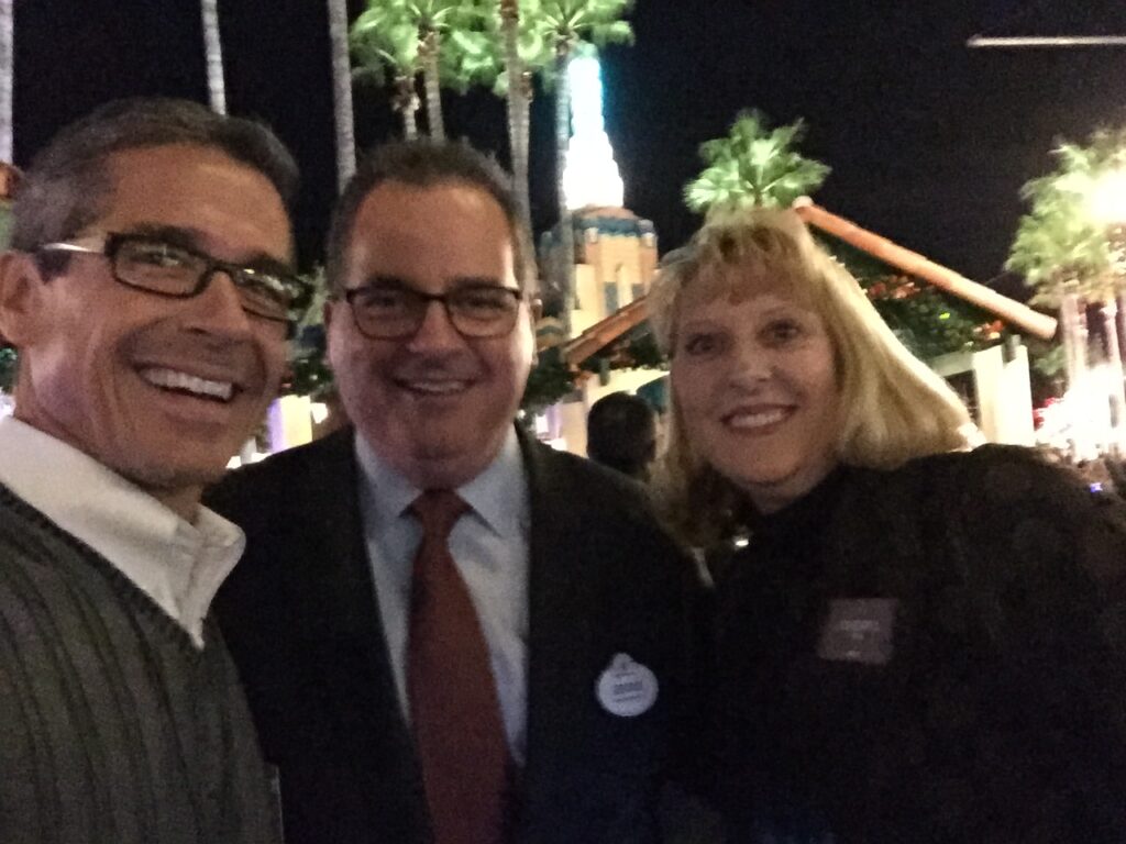 Three Disney leaders at Cast recognition event