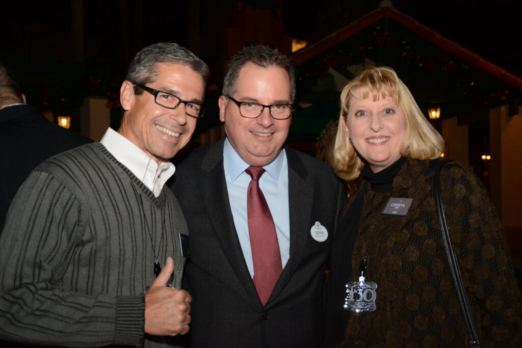 Three Disney leaders at Cast recognition event