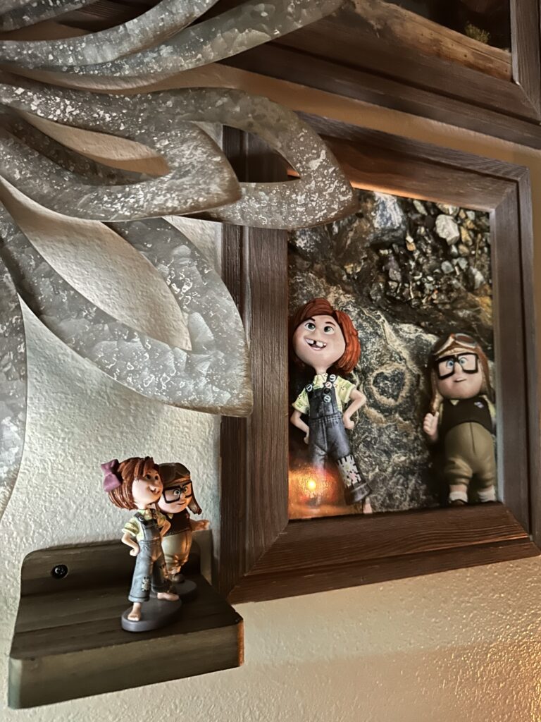 Disney Pixar toy figurines on the wall