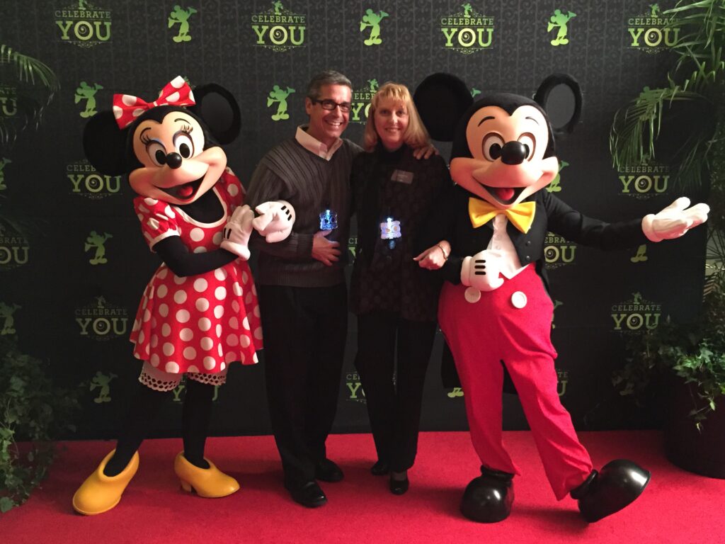 Jeff and Cheryl Noel with Mickey Mouse and Minnie Mouse