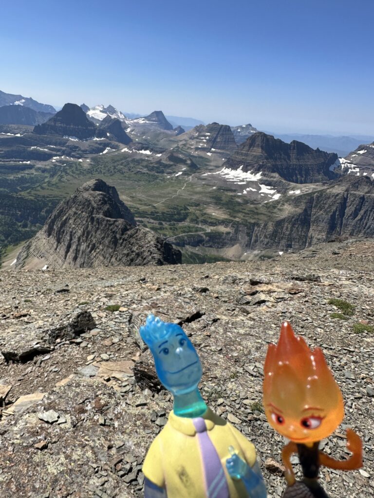 Disney pixar toy figurines in mountains
