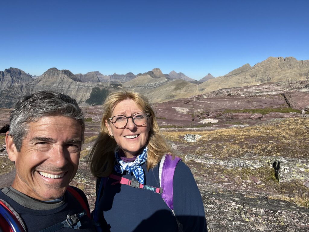 two hikers in mountains