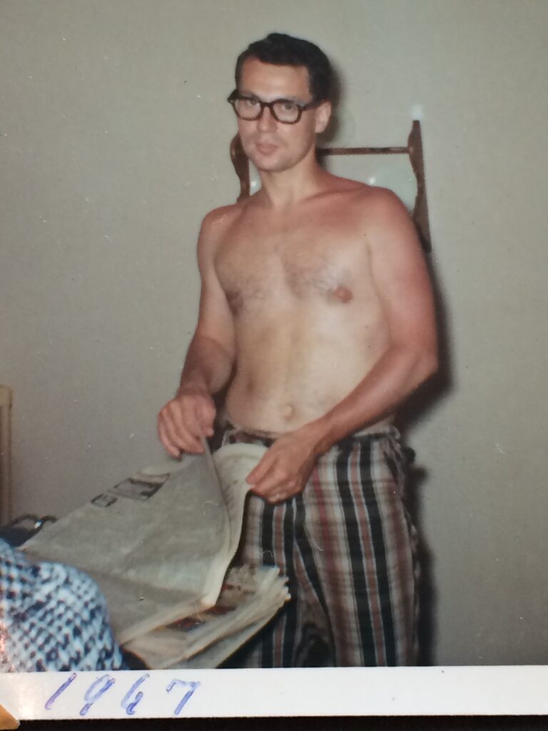 Man shirtless in a house