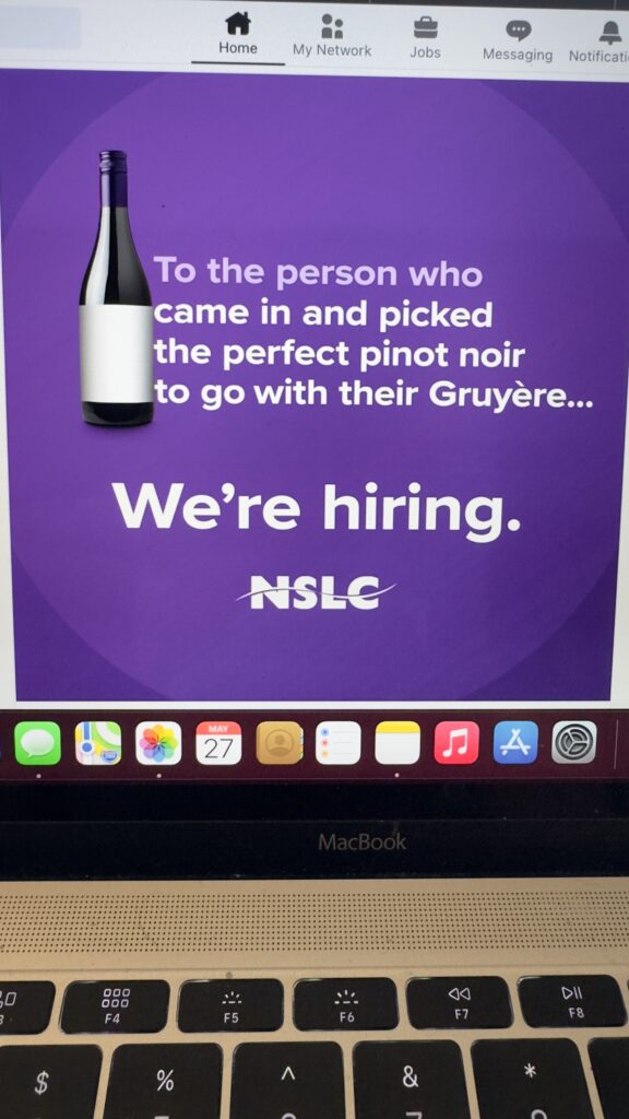 laptop showing hiring ad