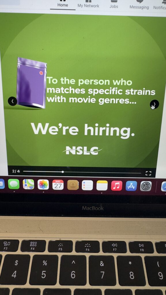 laptop showing hiring ad