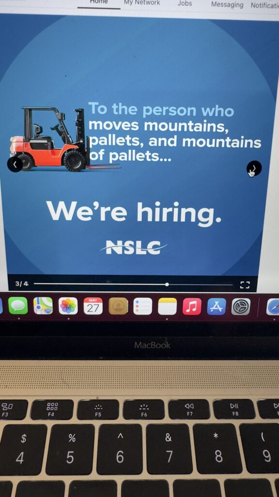 laptop showing hiring ad