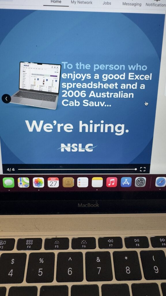 laptop showing hiring ad