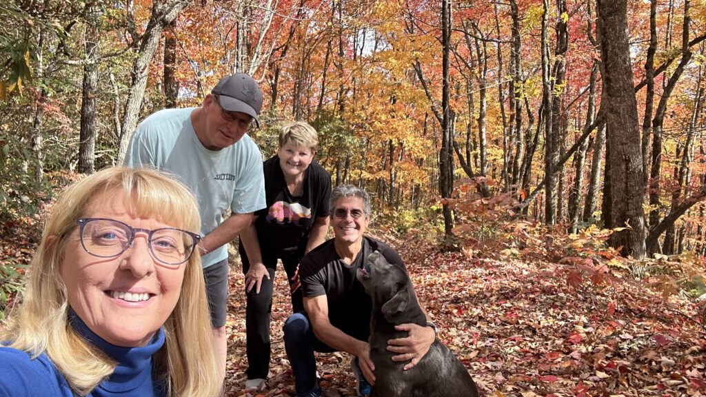 Fall foliage With four people posing