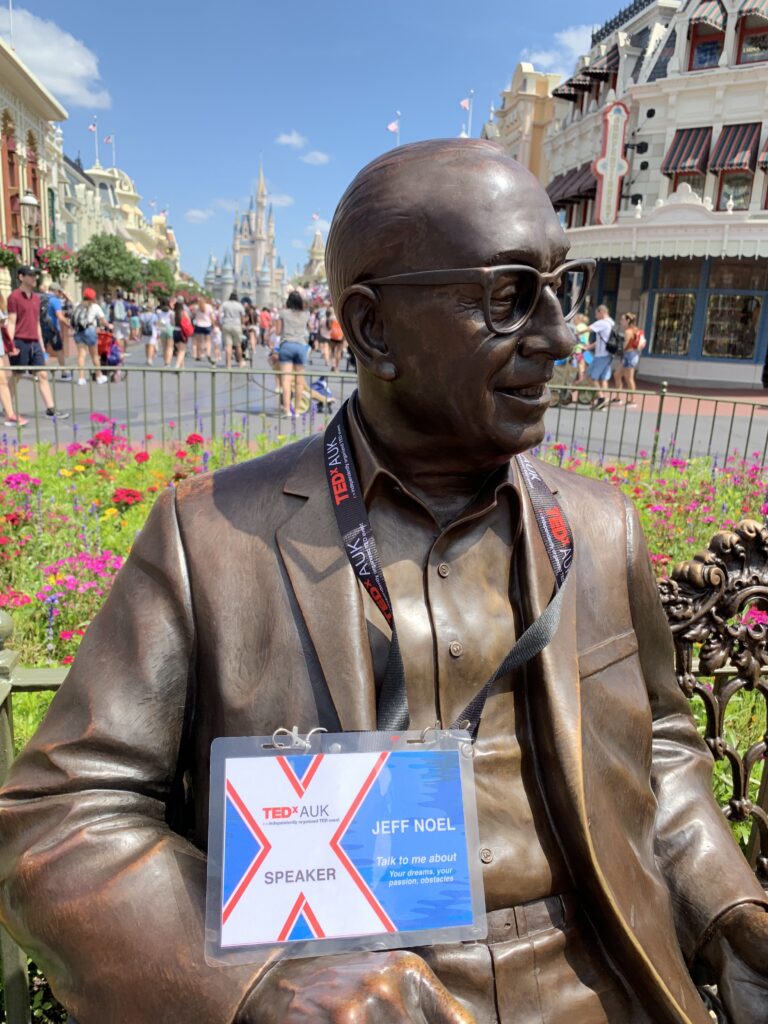 Bronze statue of Roy O Disney at Walt Disney World