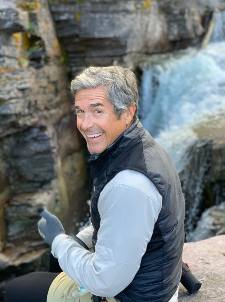 disney speaker Jeff Noel by waterfall