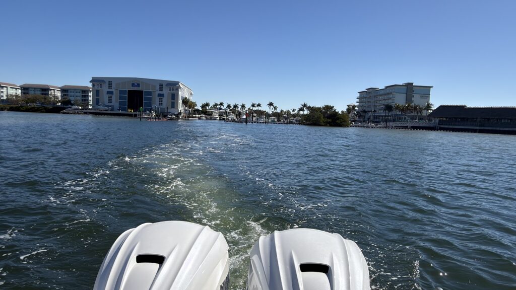 Boat leaving a marina
