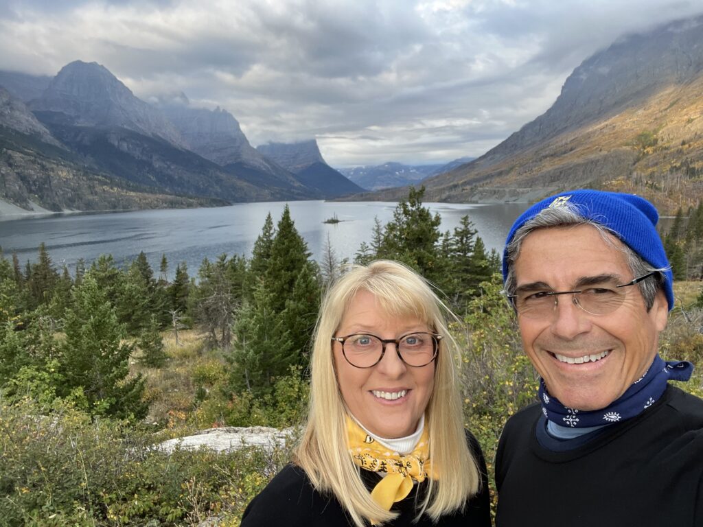 senior couple near a mountain lake